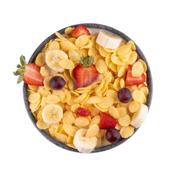 tasty breakfast cereal bowl healthy breakfast with corn flakes and fruits and unsweetened milk top view