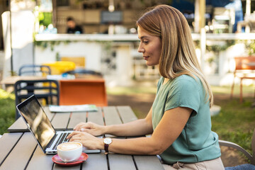 Woman, thinking and restaurant with laptop, remote work and ideas for job, online and internet....