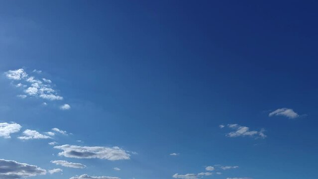 Sky full of cirrocumulus clouds and cumulus clouds that can be considered altocumulus clouds