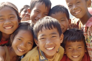 Group of children smiling in the park, close-up portrait.
