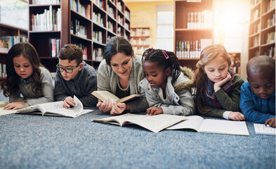 Children, education and teacher with books on library floor for reading, learning and teaching....
