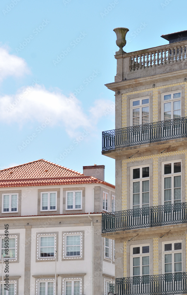 Wall mural background of two buildings in downtown porto in portugal