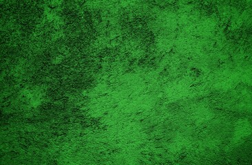 The background is made of green patterned concrete. Dark abstract green stone concrete paper texture background panorama banner long, with space for text