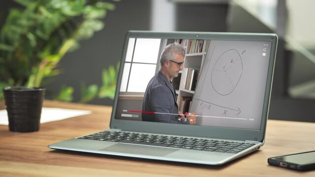 e-learning online education class,teacher does lesson on computer screen,internet course concept,professor taking classroom seminar on laptop display