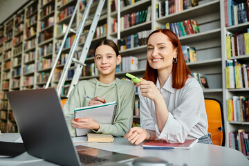 a tutor and a teenage girl, immersed in modern education, using a laptop in a cozy library setting.