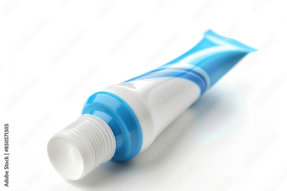 Poster a tube of toothpaste sits on a clean white surface, ready for use