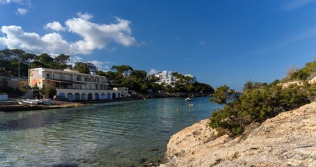 the idyllic vwhitewashed village and natural harbour of Portinatx in northern Ibiza