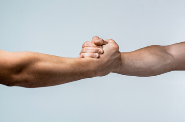 Handshake, arms, friendship. Friendly handshake, friends greeting, teamwork friendship. Rescue,...