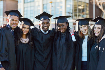 Hug, university and portrait of friends for graduation, ceremony and academic success. College, diversity and happy men and women on campus with achievement for education, learning and studying