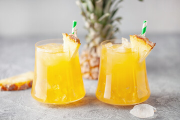 Fresh pineapple alcoholic cocktail with ice. Summer cocktail and bar concept.