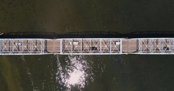 Birds eye view of cars traveling over Point of Rocks Bridge, MD