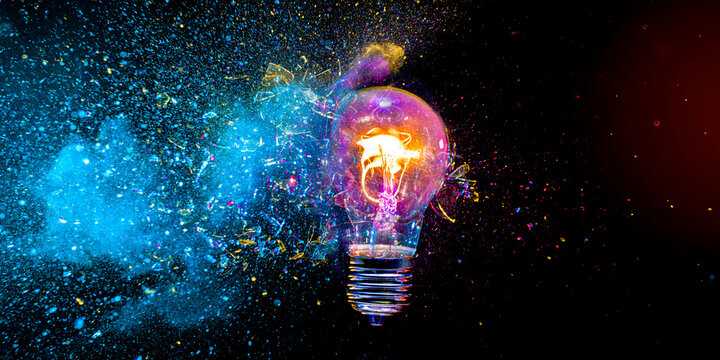 Light bulb exploding with colorful powder, Real photo