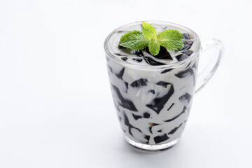 Grass jelly in milk, herbal dessert. Mesona chinensis