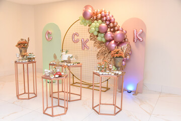  room interior, candy table, flower decoration, decorated table, table setting, birthday party, ballroom, cake table, cake and candy table,  party room, assembly room
