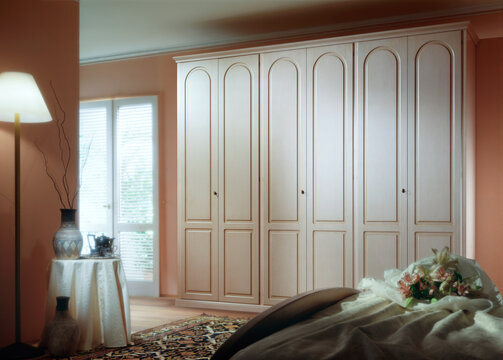 Single shot photo of a room with a wardrobe