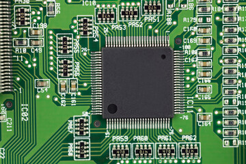 Green Circuit Board with Central Black Chip