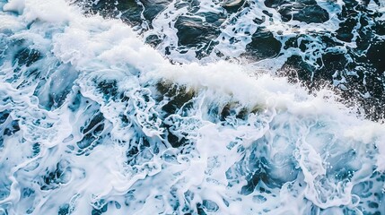 Fototapeta premium Close-up of ocean waves, gentle natural light, rolling and foamy texture. 