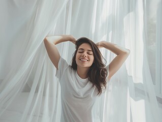 Fototapeta premium Happy young woman stretching in bed waking up alone happy concept, in cozy comfortable bedroom, enjoy good morning