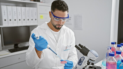 Man scientist working laboratory research microscope healthcare