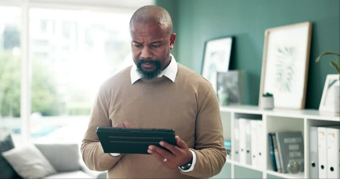 Thinking, remote work and businessman with tablet in house with schedule check, planning or email communication. Digital, research and African real estate agent with app for networking or solution