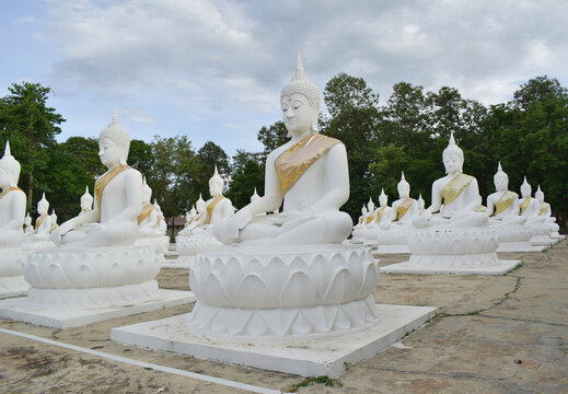 The white Buddha statue was created by a devotee for a Buddhist temple.Thailand, Khemmarat, Ubon ratchathani