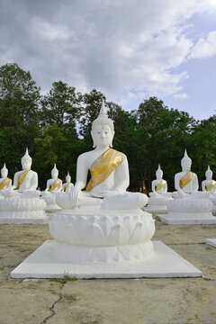 The white Buddha statue was created by a devotee for a Buddhist temple.Thailand, Khemmarat, Ubon ratchathani