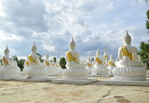 The white Buddha statue was created by a devotee for a Buddhist temple.Thailand, Khemmarat, Ubon ratchathani