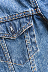 Fototapeta premium pocket of blue denim texture background, jean fashion style