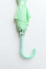 close green umbrella isolated on white background