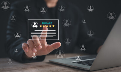 Businessman using a laptop with a virtual interface showing an excellent rating system and multiple user profiles. Symbolizes digital business evaluation and customer feedback.
