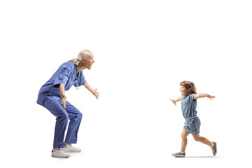 Profile shot of a happy female health care worker waiting to hug a little girl