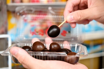 Tamsui Iron Eggs, a famous snack from New Taipei City's Tamsui District, are known for their unique braising method and texture, made from chicken or quail eggs.