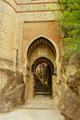 Fototapeta premium View of the entrance to the Rocchetta Mattei, Grizzana Morandi, Bologna, Emilia Romagna, Italy