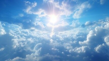 The sky has the light of the sun, the sky is blue, there are small and large clouds alternating and moving slowly, with the sunlight passing, creating a miraculous abstract shape, a hot day..