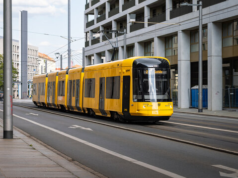 DRESDEN, GERMANY - 10. May 2024: NGT DX DD railcar 2905 on line 2 to Gorbitz. The new yellow tram is part of the public transportation in the city. The DVB is running the transport company.