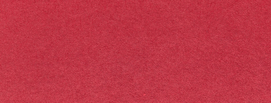 Texture of craft red paper background colors, macro. Structure of vintage kraft wine cardboard. Felt ruby backdrop