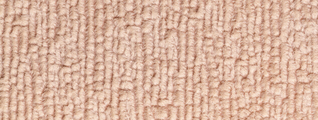 Texture of light beige fluffy woolen textile background from soft fleecy material, macro. Structure of pearl fabric