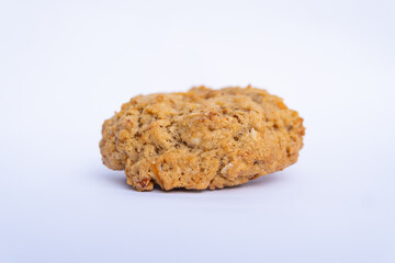 Close up of carrot cookie on white background