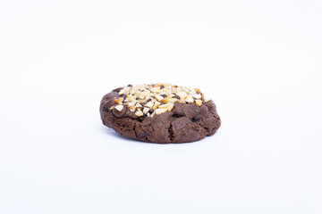 chocolate chip cookie with peanut butter on white background