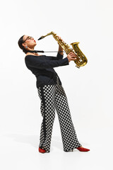 Stylish woman, musician in visually striking outfit plays the saxophone with passion and style...