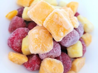 Frozen mango, strawberries and pineapple cubes.
