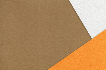 Texture of craft brown color paper background with white and orange border. Vintage abstract umber cardboard.