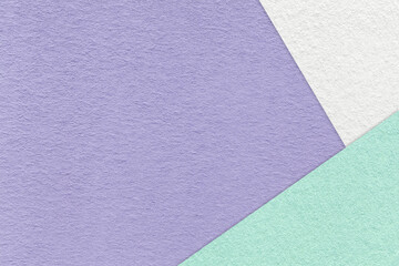 Fototapeta premium Texture of craft violet color paper background with white and cyan border. Vintage abstract cardboard.