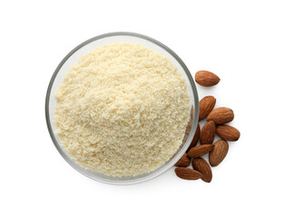 Fresh almond flour in bowl and nuts isolated on white, top view