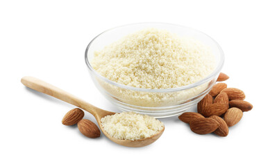 Fresh almond flour in bowl, spoon and nuts isolated on white