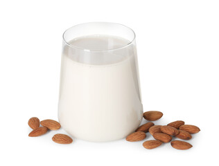 Glass of almond milk and almonds isolated on white