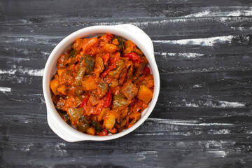 gourmet ratatouille in a white bowl.