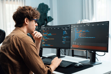 Working IT developer with stressful overworked in creating online software development coding on pc...