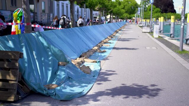 Emergency flood protection barrier with sand bags next to Harbour in Lake Konstanz Germany