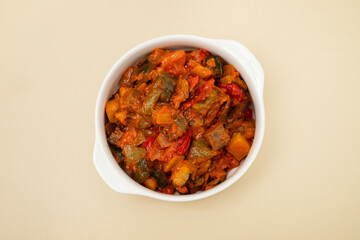 gourmet ratatouille in a white bowl.